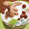 рецепт с фото: детский торт-рулет с динозавриком из мастики